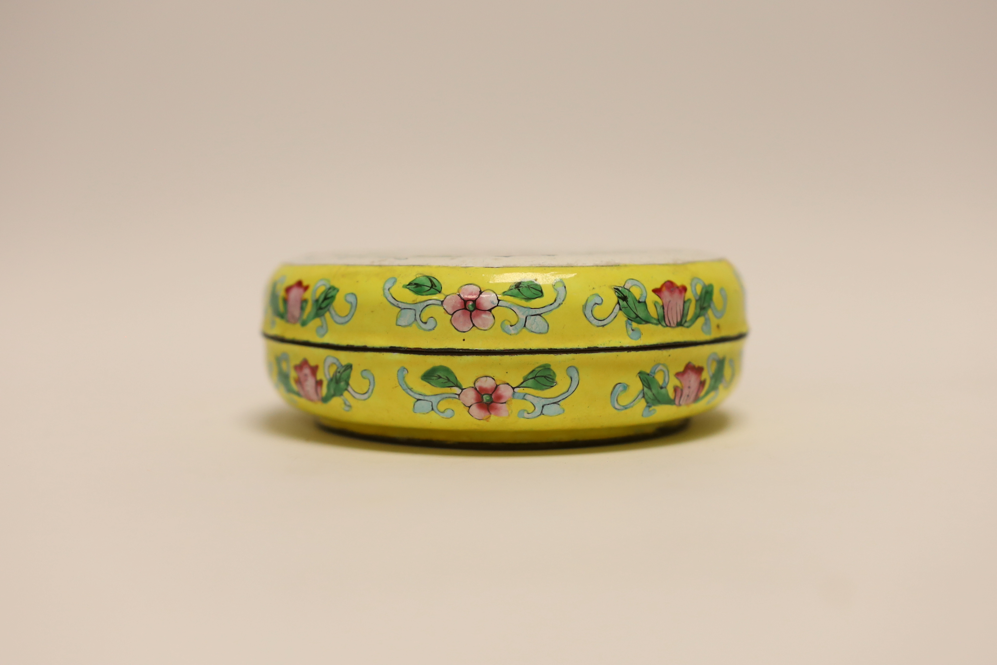 A Chinese Canton enamel circular box and cover, 13cm diameter